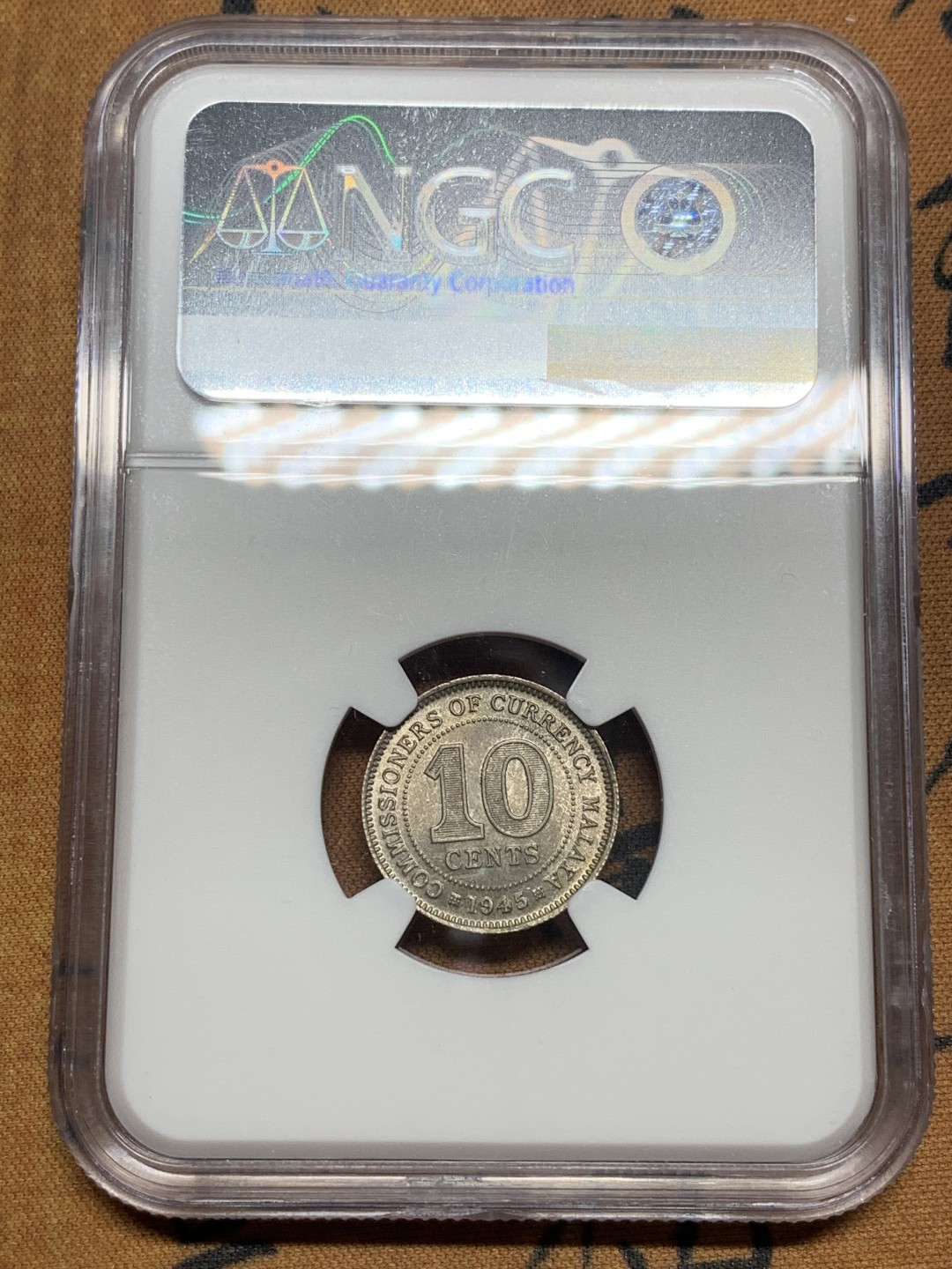 《竞宝斋》第84场-本周日，周一2场连拍（全场不限金额包邮） NGC-MS63 马来亚1945年10分银币。少见年份(常见是1941年)。