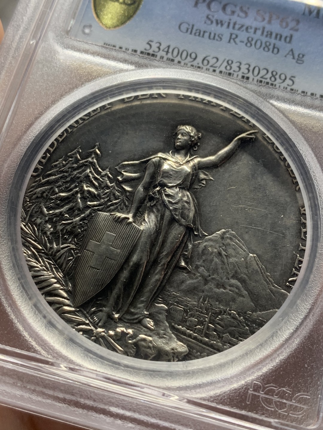 《竞宝斋》第84场-本周日，周一2场连拍（全场不限金额包邮） PCGS SP62 瑞士1892年格拉鲁斯射击节女神高浮雕大银章 精美镜面高浮雕