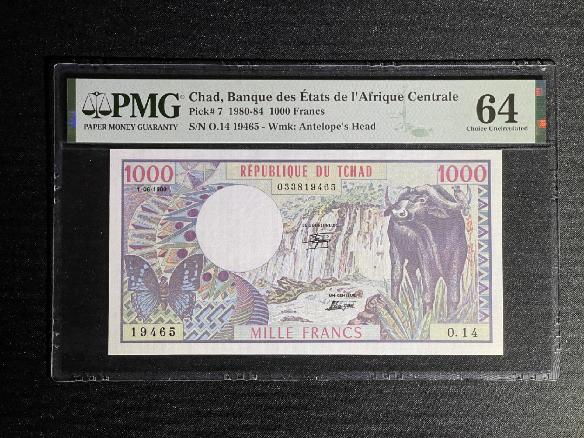 《张总收藏》68期——冠军分 乍得1000法郎 PMG64 1980年 水牛