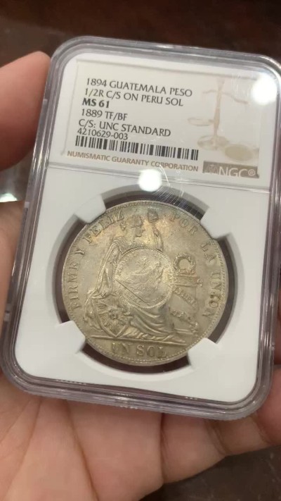 《竞宝斋》第84场-本周日，周一2场连拍（全场不限金额包邮） NGC-MS61 1894年 危地马拉加盖 秘鲁索尔 银币 热门南美 少见加盖 涨势不错