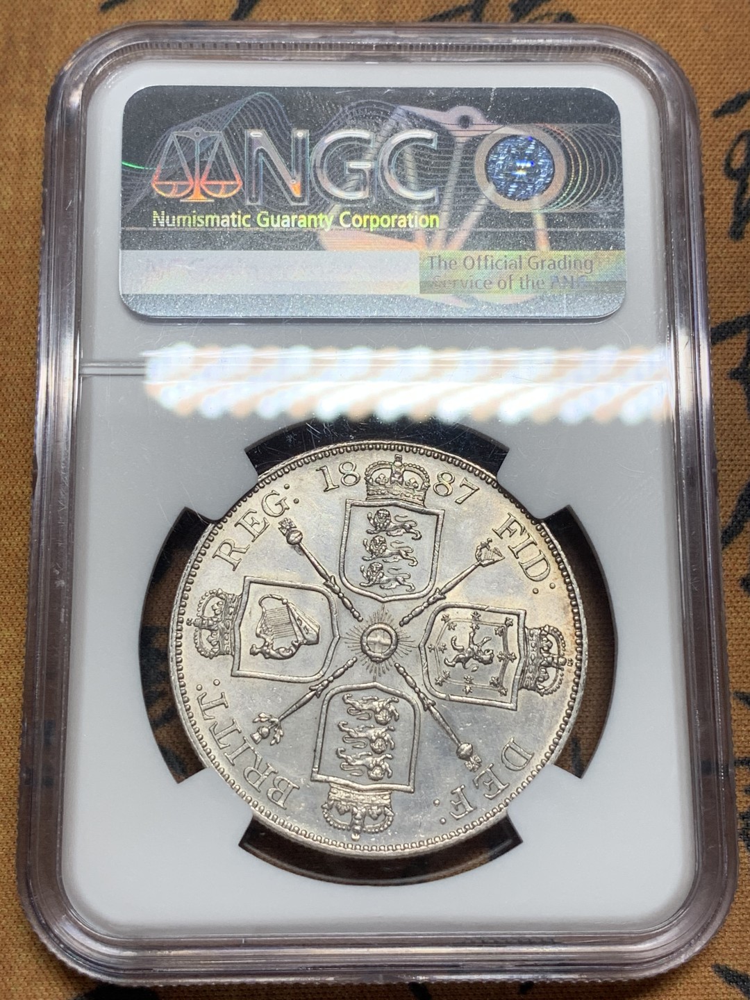 《竞宝斋》第84场-本周日，周一2场连拍（全场不限金额包邮） NGC严评 UNC 1887英国维多利亚4S双福林银币，（仅在1887-1890年间铸造），底板光洁细节深峻，无磕碰，年份日期阿拉伯数字1