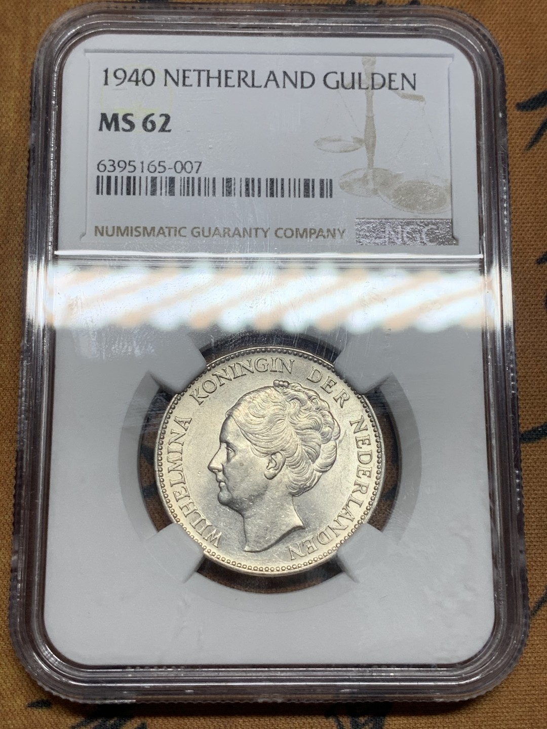 《竞宝斋》第84场-本周日，周一2场连拍（全场不限金额包邮） NGC-MS62 荷兰   1940年 1盾 威廉米娜女王 标准车轮光