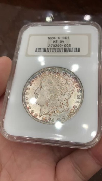 《竞宝斋》第84场-本周日，周一2场连拍（全场不限金额包邮） NGC-MS64 美国 1884-O 1美元 摩根银币 老盒 原光环彩
