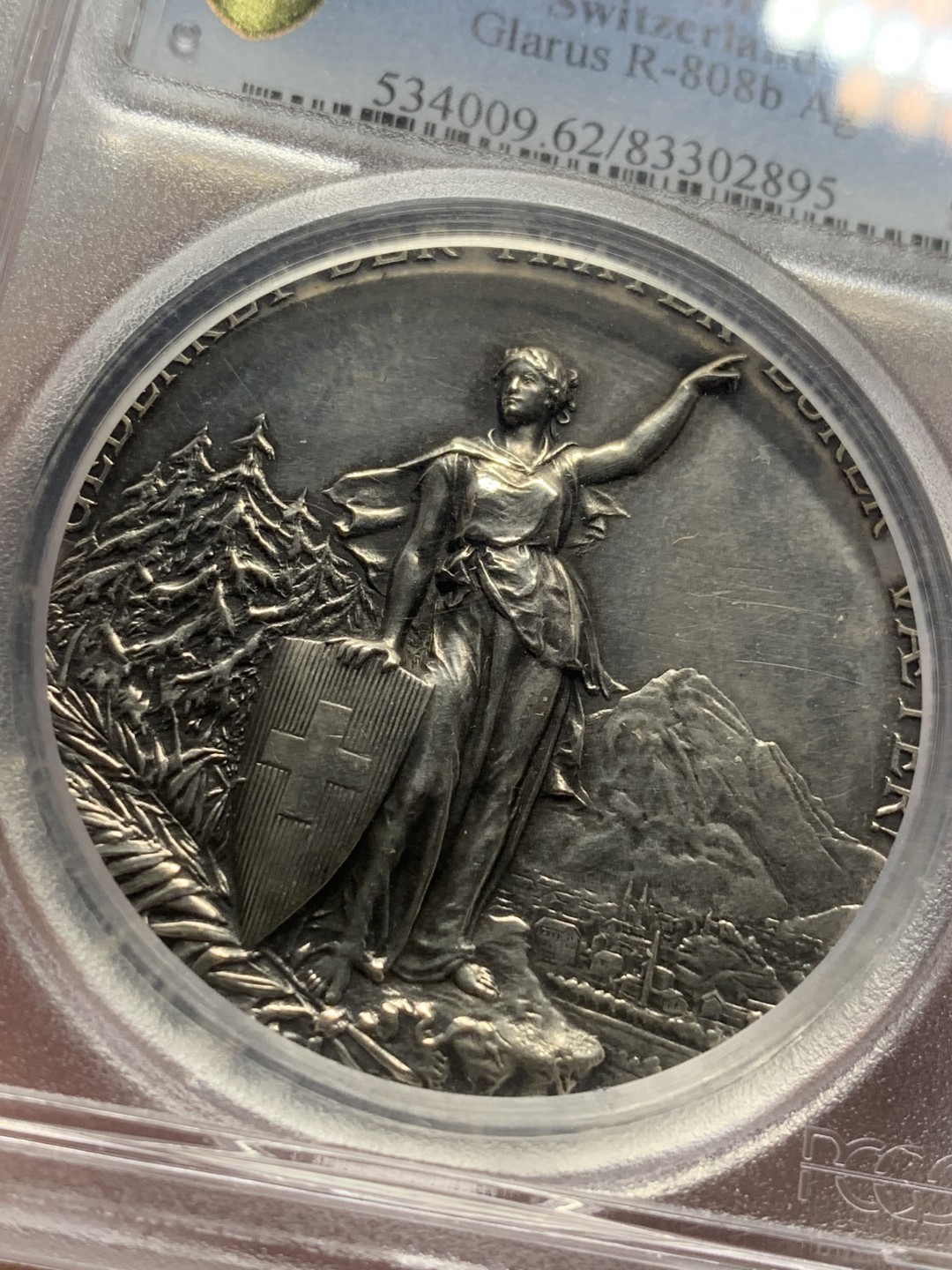 《竞宝斋》第84场-本周日，周一2场连拍（全场不限金额包邮） PCGS SP62 瑞士1892年格拉鲁斯射击节女神高浮雕大银章 精美镜面高浮雕