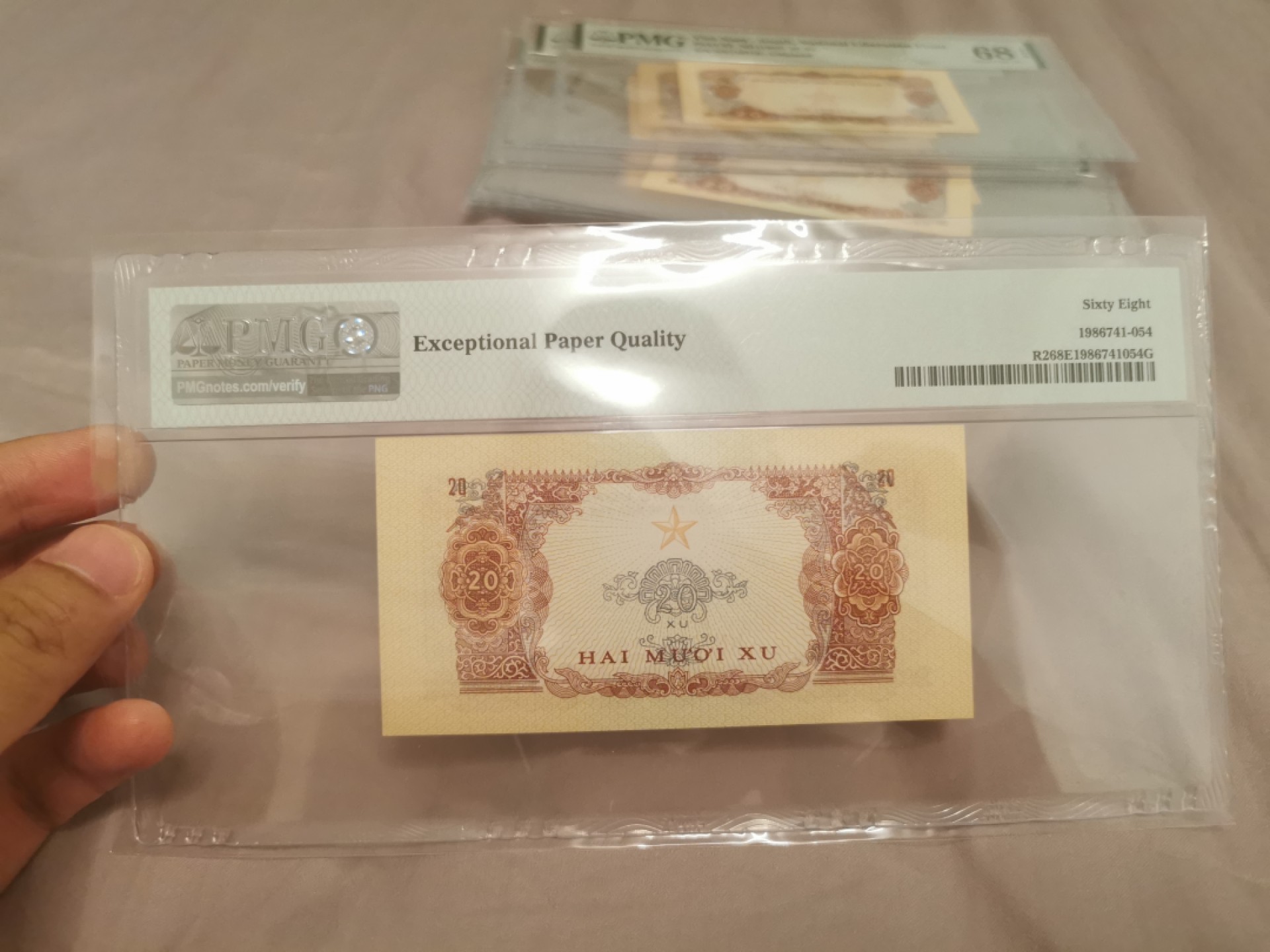 20.【鲸贝乐淘★道德经】“使夫智者不敢为也”号拍卖 【中国代印★越南🇻🇳★雷达号719719】1968年20XU，PMG68E，高分稀有难得