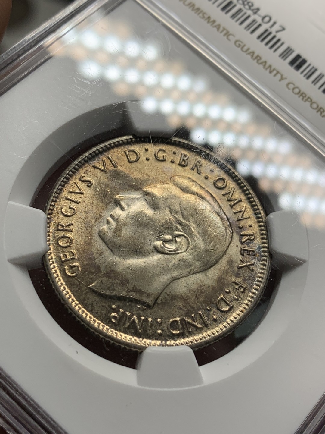 《竞宝斋》第84场-本周日，周一2场连拍（全场不限金额包邮） NGC  MS63澳大利亚1944年S厂1佛洛琳银币淡黄包浆，细节完美