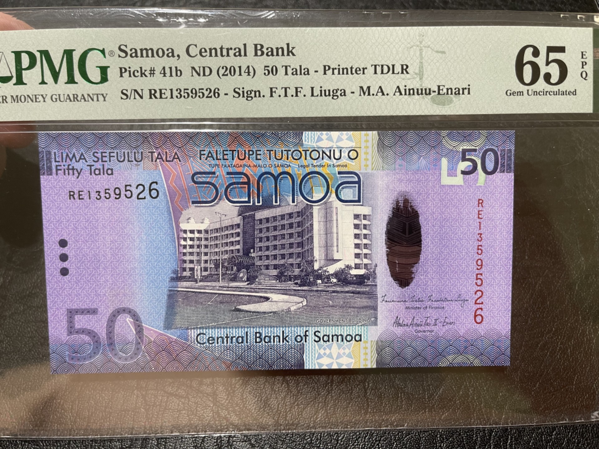 《外钞收藏家》第一百九十五期 2014年萨摩亚50 PMG65 无47