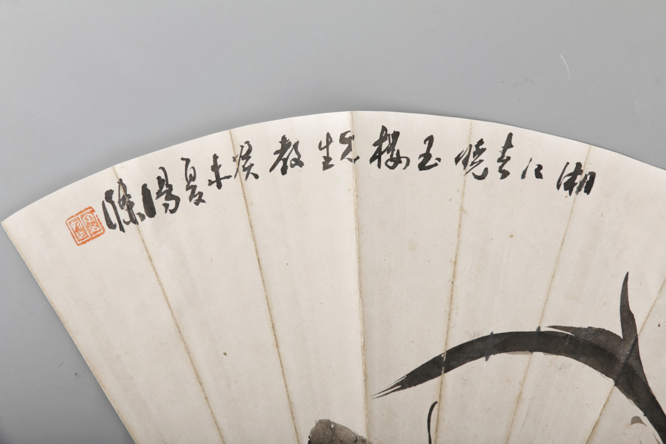 锦灰-中国书画、奏折文献、名人礼札、相片纸品专场 汤涤 《兰石图》扇面-纸本托片-14×39cm