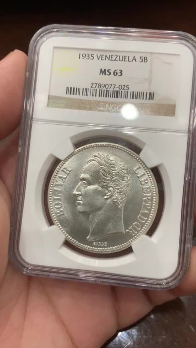 《竞宝斋》第85场-本周日，周一2场连拍（全场不限金额包邮） NGC-MS63 委内瑞拉1935年 5波利瓦大银币 车轮转光 这品种平时多见就是VF-XF ，这品相已经顶级