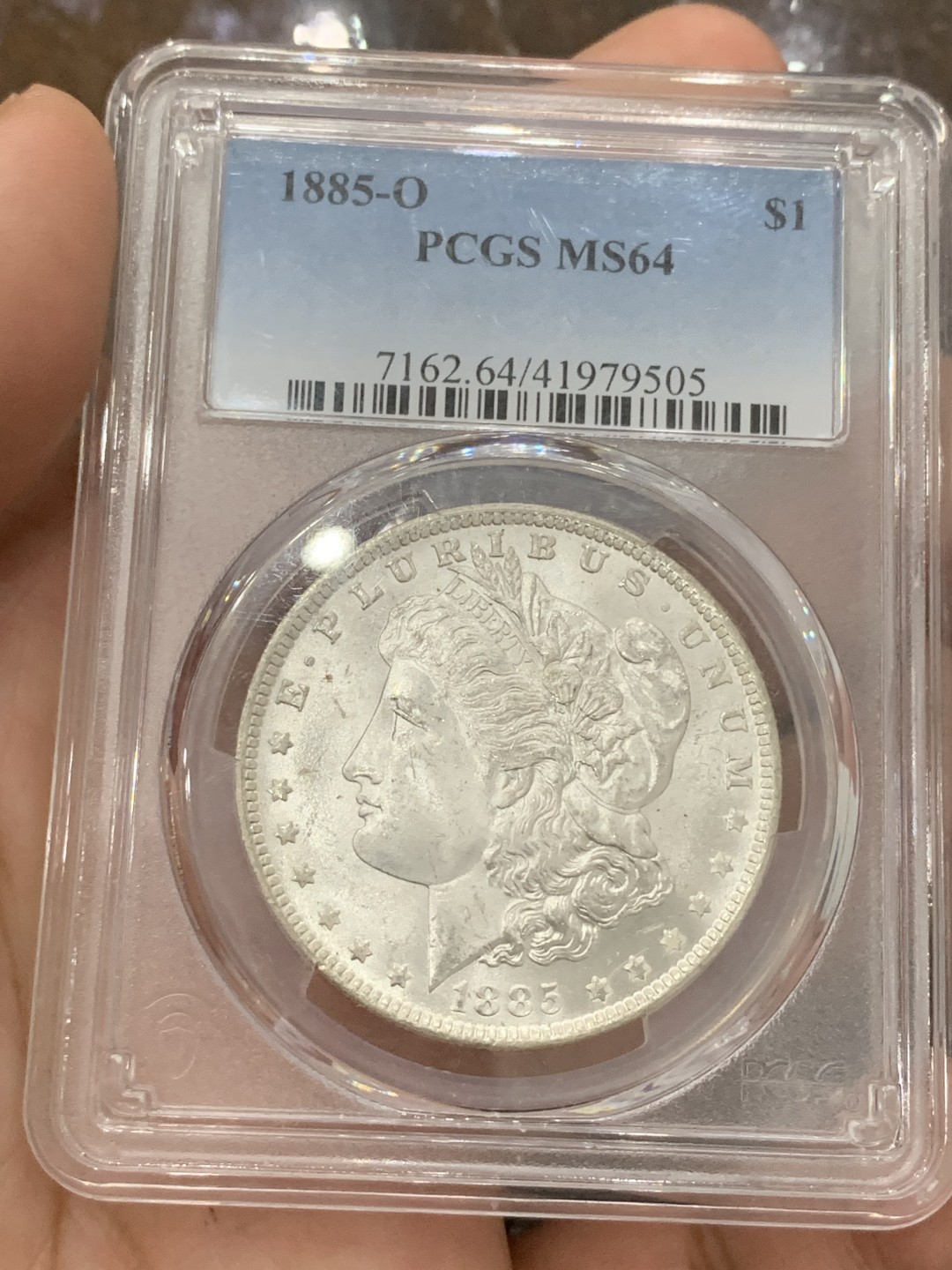 《竞宝斋》第85场-本周日，周一2场连拍（全场不限金额包邮） PCGS-MS64 美国 1885年O版 1美元 摩根银币 极美原光摩根白币 底板丝滑赏心悦目 光度很好 在64里算脸比较干净的