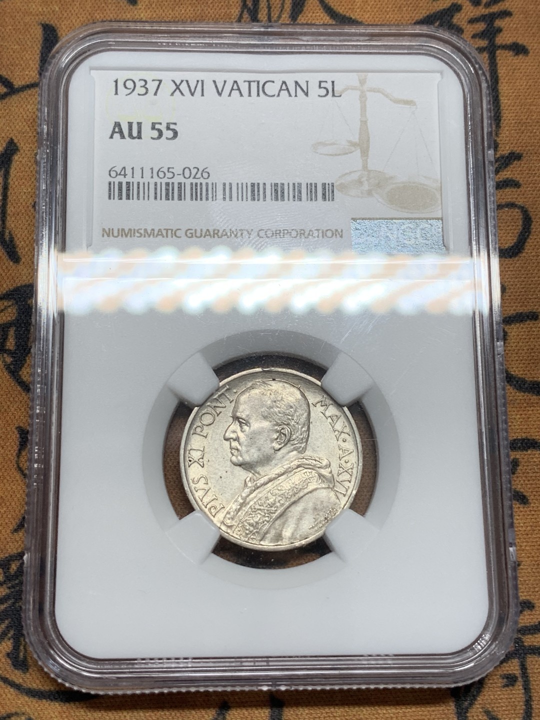 《竞宝斋》第85场-本周日，周一2场连拍（全场不限金额包邮） NGC AU55 梵蒂冈 1937年 5里拉 划船 银币 不多见的头像