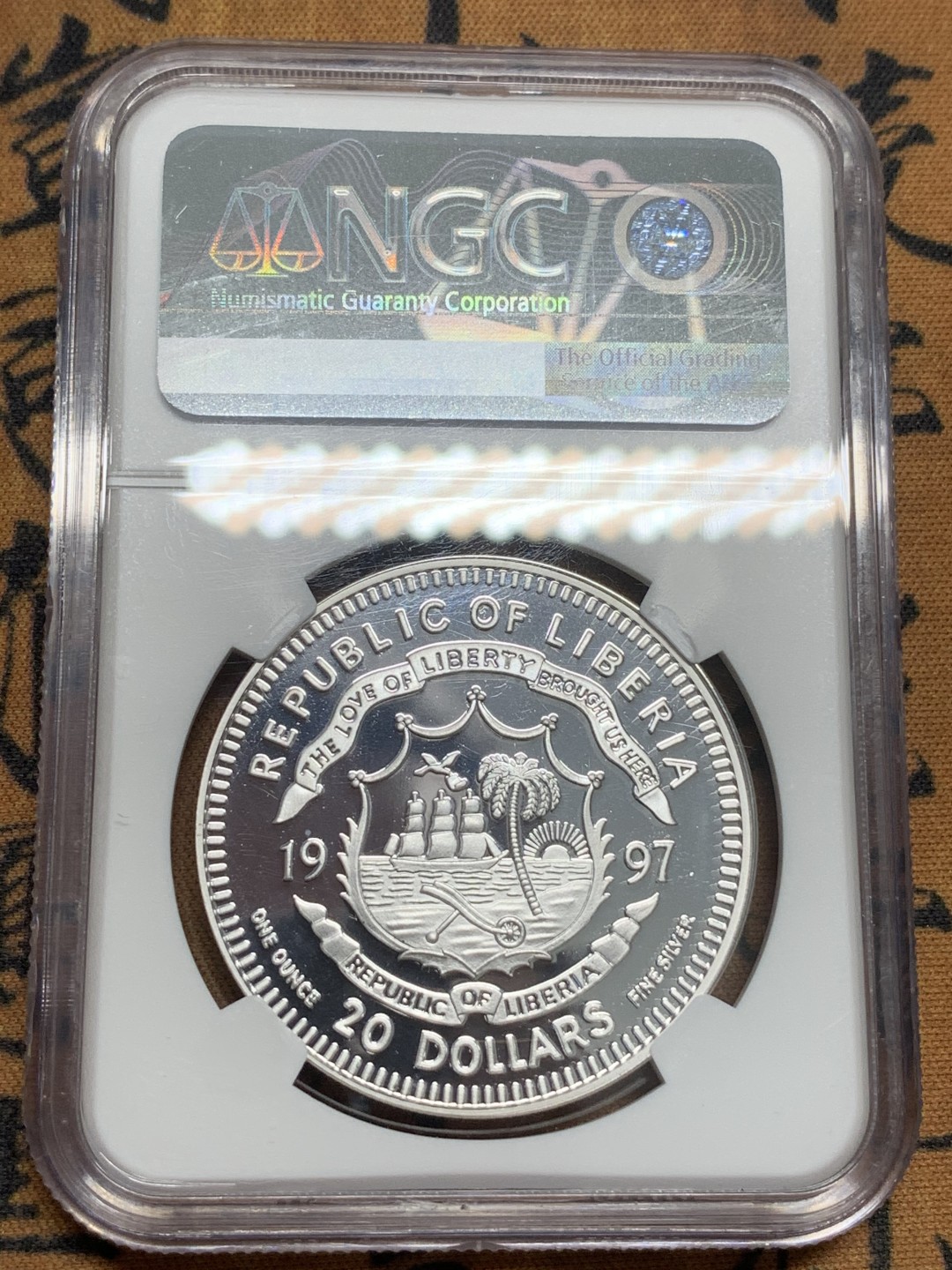 《竞宝斋》第85场-本周日，周一2场连拍（全场不限金额包邮） NGC PF69UC 利比里亚 1997年小平盎司级纪念币2枚，含一枚盎司级银币，NGC评级亚军分