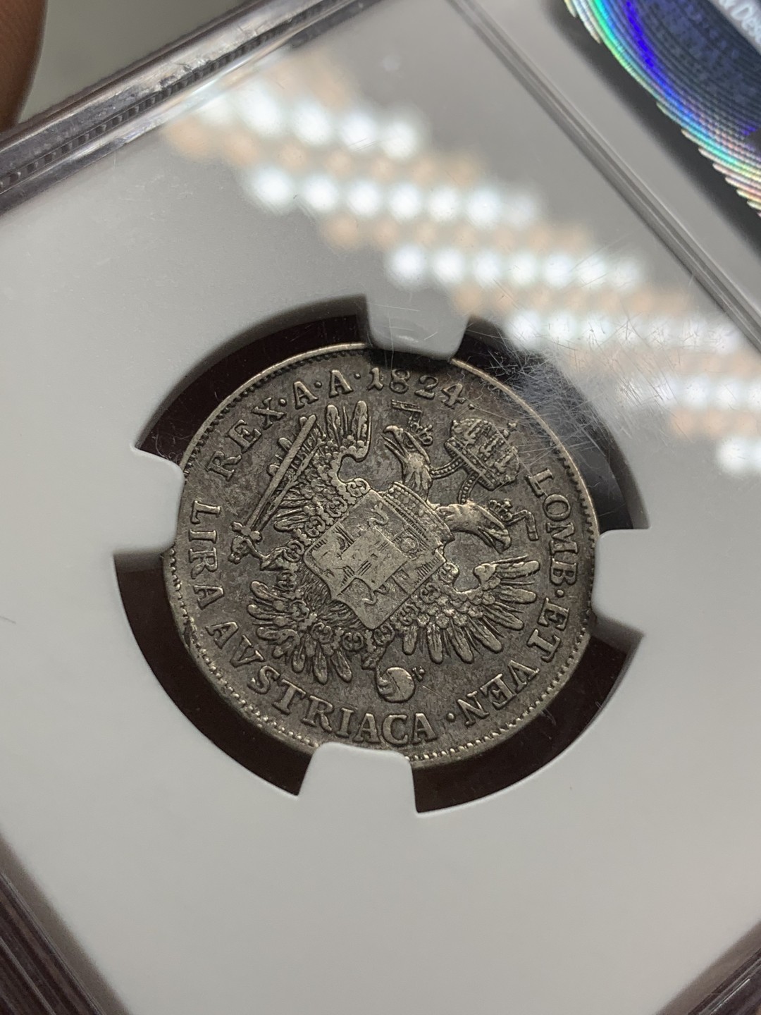 《竞宝斋》第85场-本周日，周一2场连拍（全场不限金额包邮） NGC 1824年奥属意大利伦巴第1里拉银币 细节清晰 少见品种