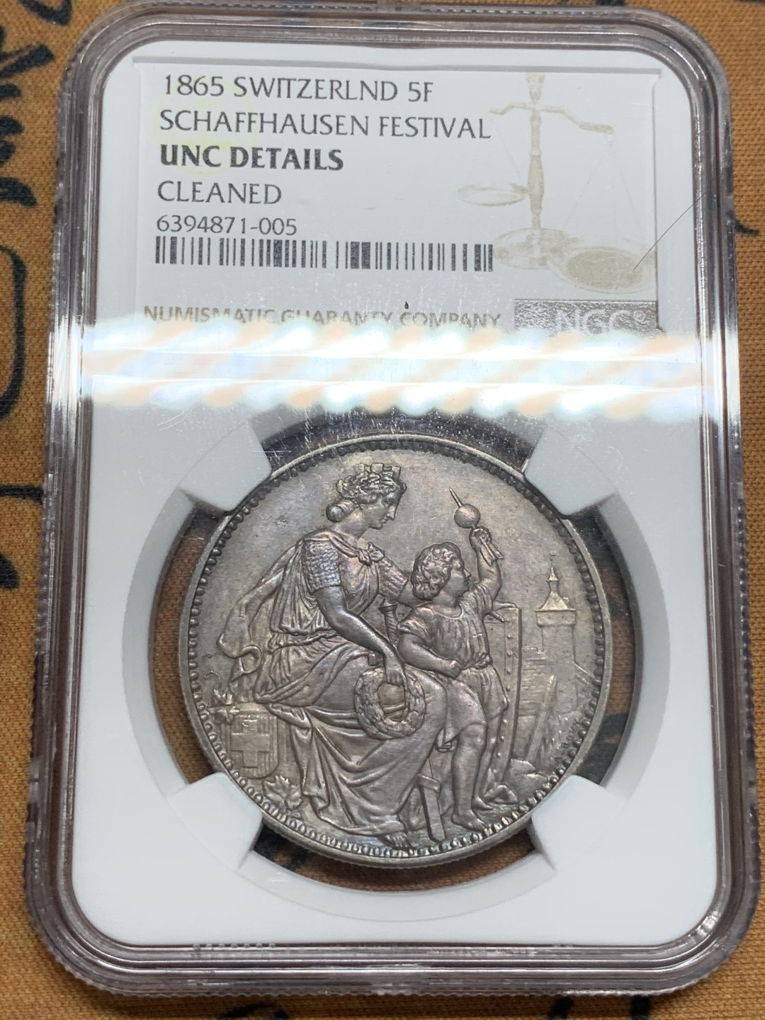 《竞宝斋》第85场-本周日，周一2场连拍（全场不限金额包邮） NGC-UNCD 瑞士 1865年 5法郎 沙夫豪森射击节银币 紫罗兰包浆