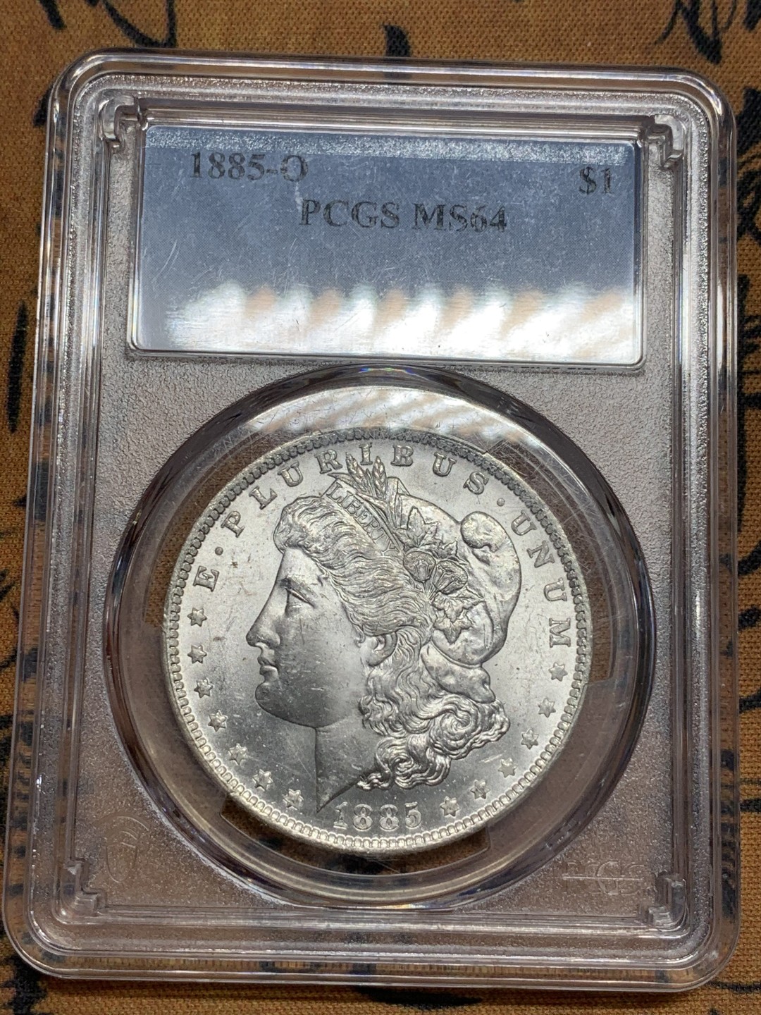 《竞宝斋》第85场-本周日，周一2场连拍（全场不限金额包邮） PCGS-MS64 美国 1885年O版 1美元 摩根银币 极美原光摩根白币 底板丝滑赏心悦目 光度很好 在64里算脸比较干净的