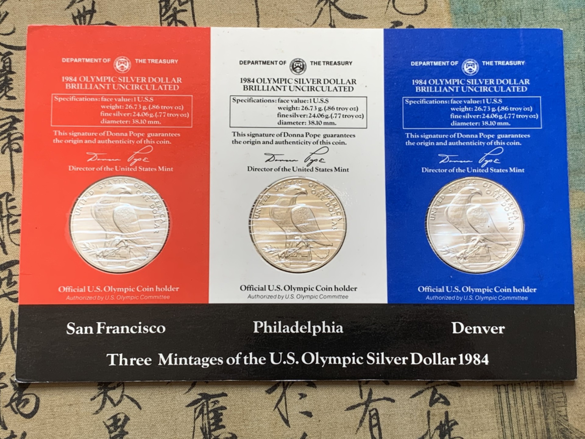 《竞宝斋》第89场-本周日，周一，周四，3场连拍（全场不限金额包邮） 美国1984 老鹰 1元大银币 三枚不同厂 封装套 单枚26.8克