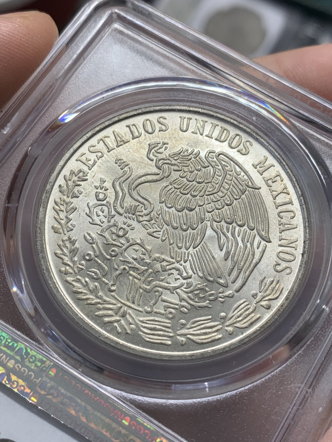 《竞宝斋》第89场-本周日，周一，周四，3场连拍（全场不限金额包邮） PCGS-MS64  墨西哥 1977年MO 普拉塔普拉100比索银币 