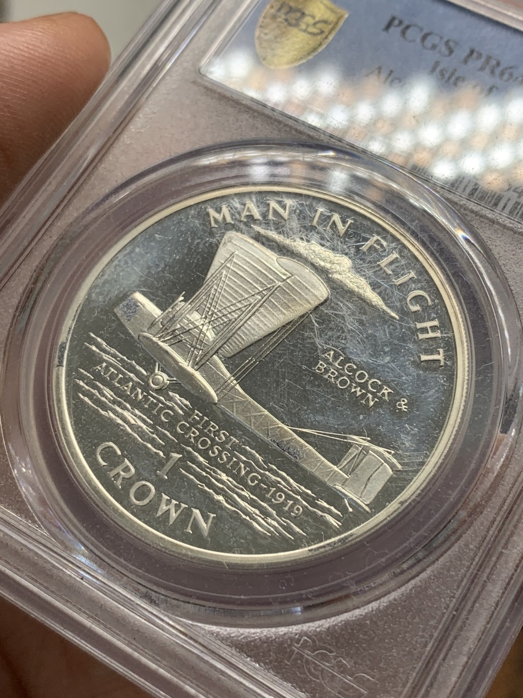 《竞宝斋》第89场-本周日，周一，周四，3场连拍（全场不限金额包邮） PCGS-PR64  马恩岛 1994年 纪念第一次横跨大西洋克朗银币 