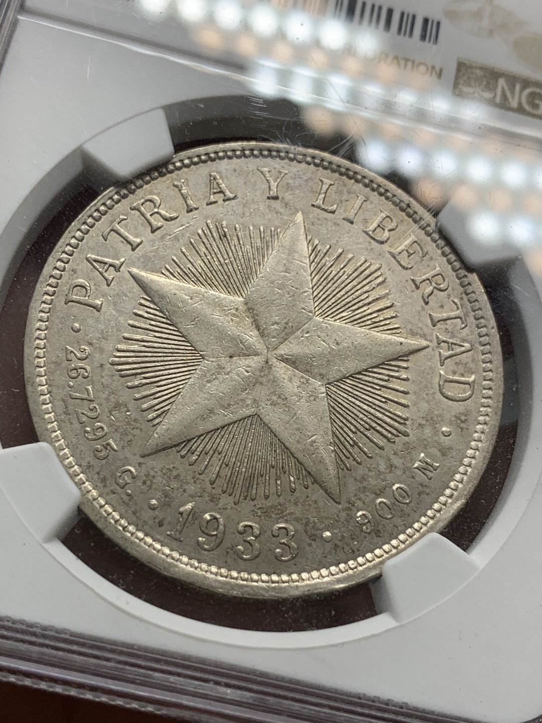 《竞宝斋》第89场-本周日，周一，周四，3场连拍（全场不限金额包邮） NGC-AUD  古巴 1933年 五星 1比索银币 