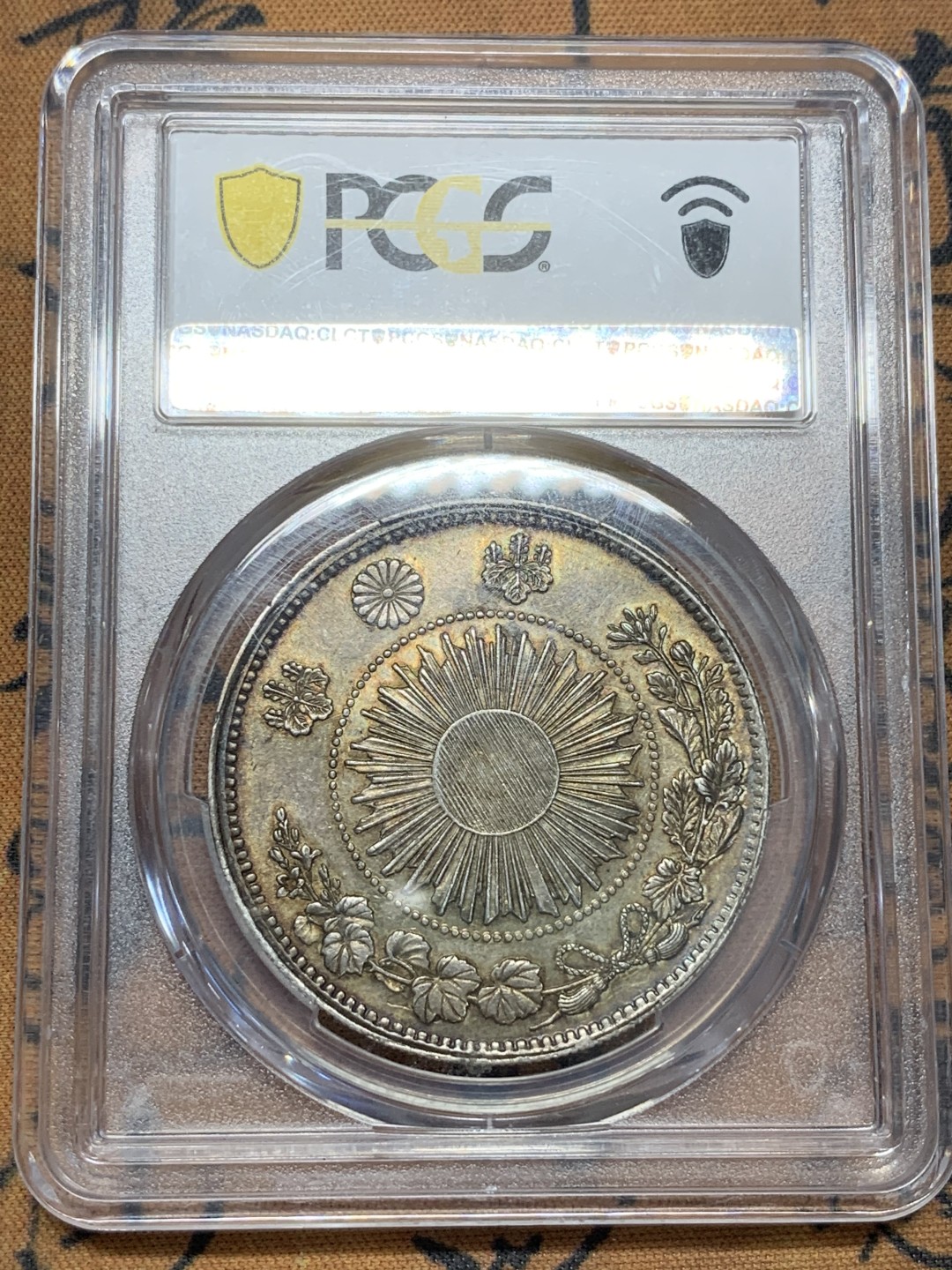 《竞宝斋》第91场-本周日，周一2场连拍（全场不限金额包邮） PCGS AU55 原味五彩日本明治三年龙洋一元银币