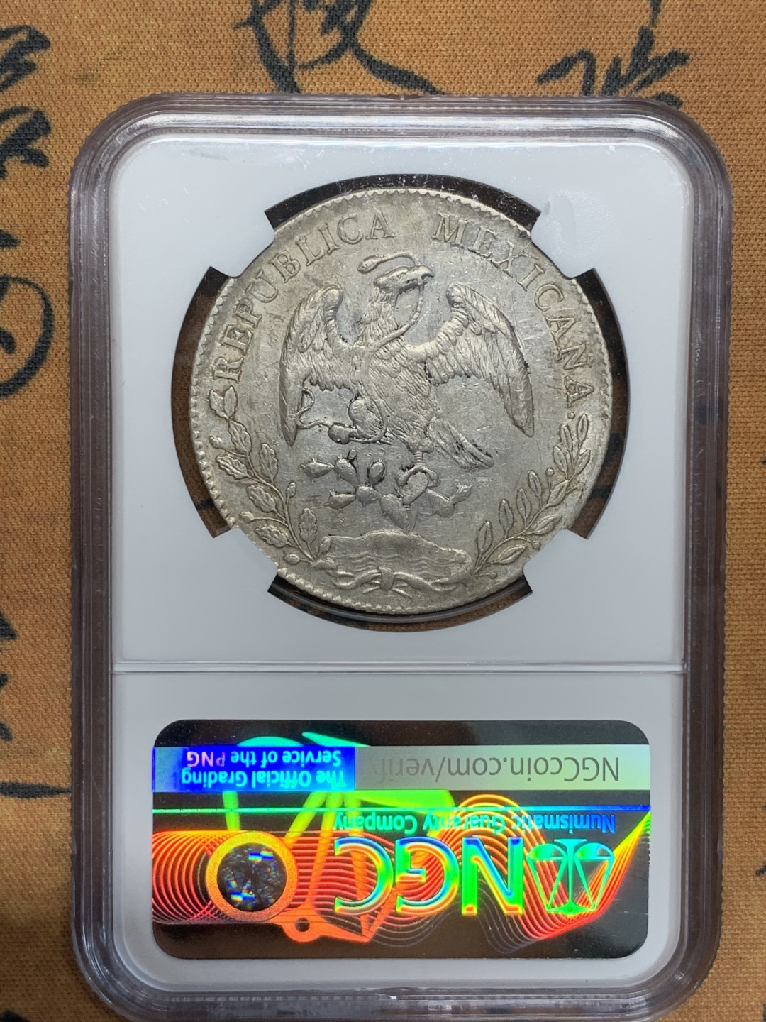 《竞宝斋》第91场-本周日，周一2场连拍（全场不限金额包邮）  NGC-UNC 墨西哥 1891年 MO AM版8R鹰洋银币 有污渍 洗洗可搏分