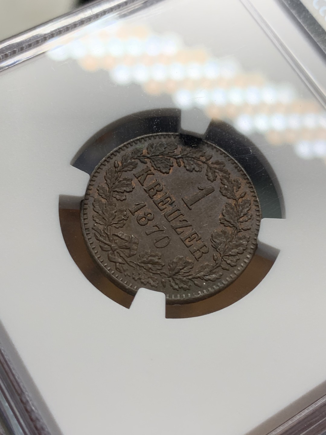 《竞宝斋》第91场-本周日，周一2场连拍（全场不限金额包邮） NGC-MS63BN 1870年 德国 巴登1克鲁泽铜币 亚军分数，经典双狮盾徽。