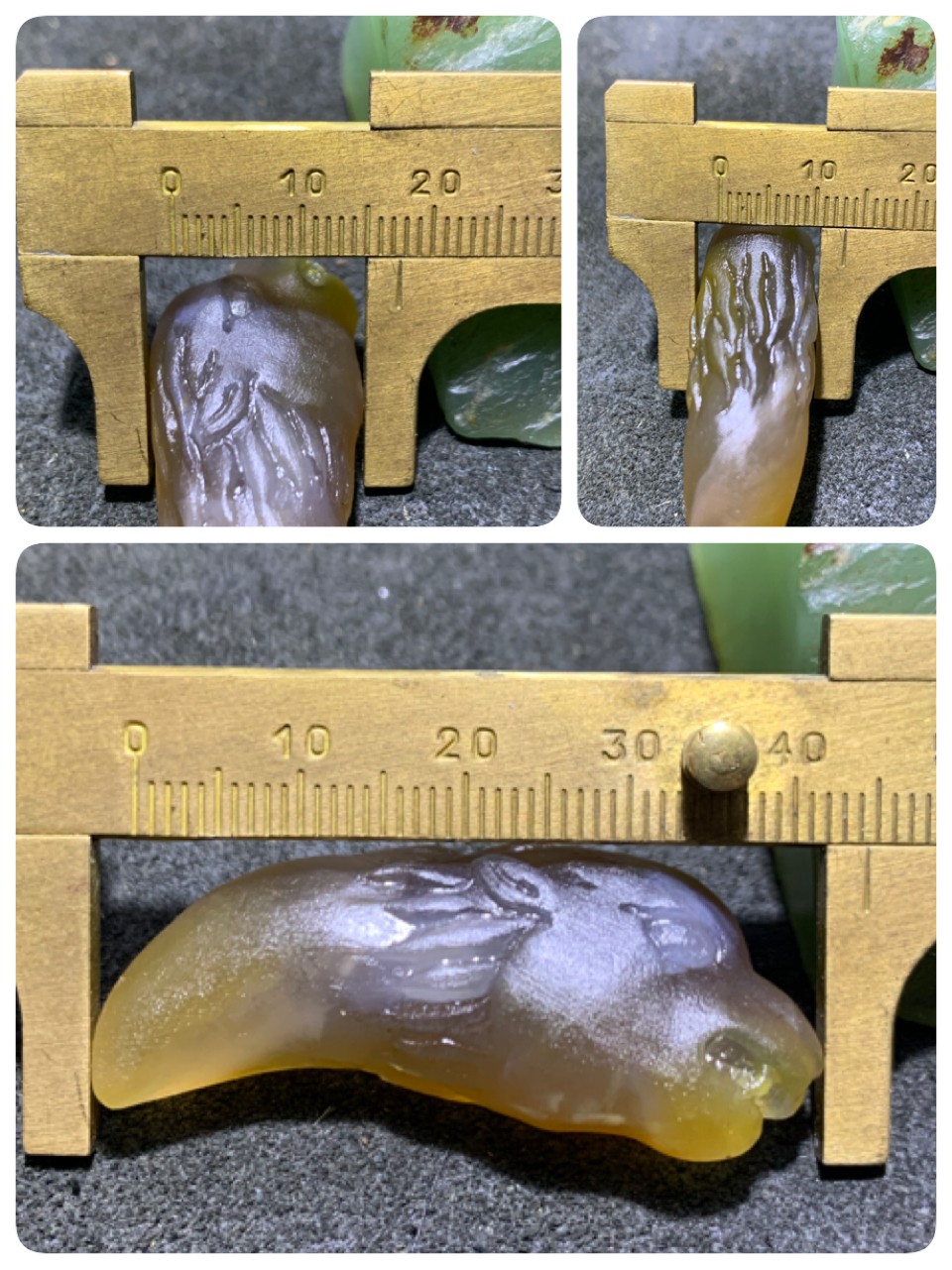 精美亚光蒙料战国红玛瑙雕刻兽首牙形吊坠一个，