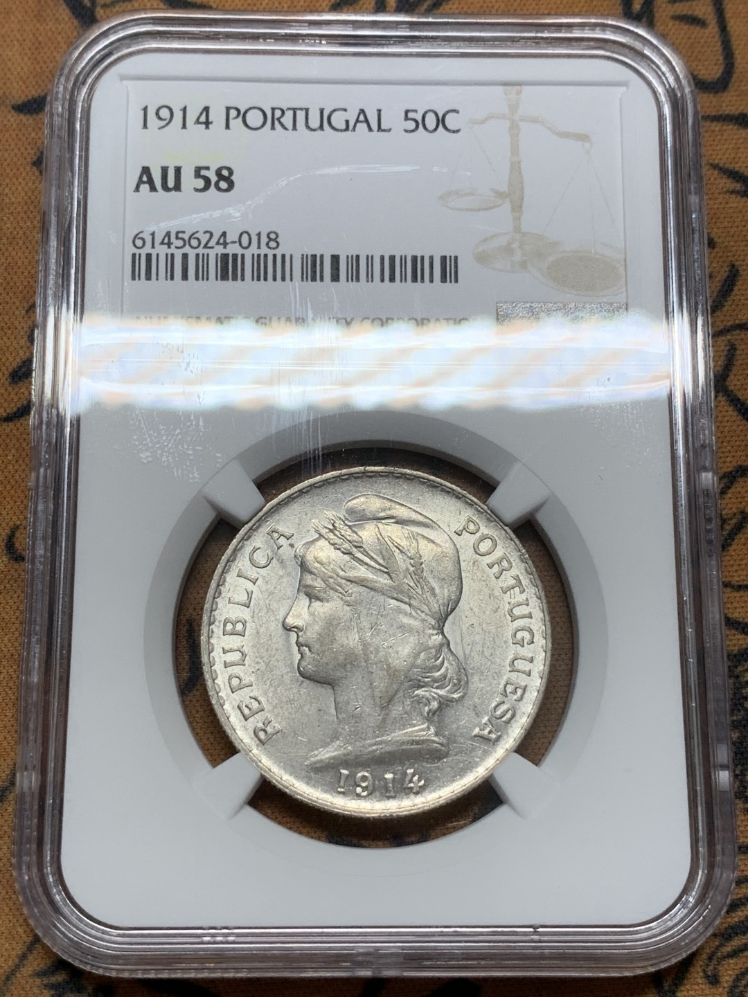 《竞宝斋》第91场-本周日，周一2场连拍（全场不限金额包邮） NGC AU58 葡萄牙1914年半元女神银币