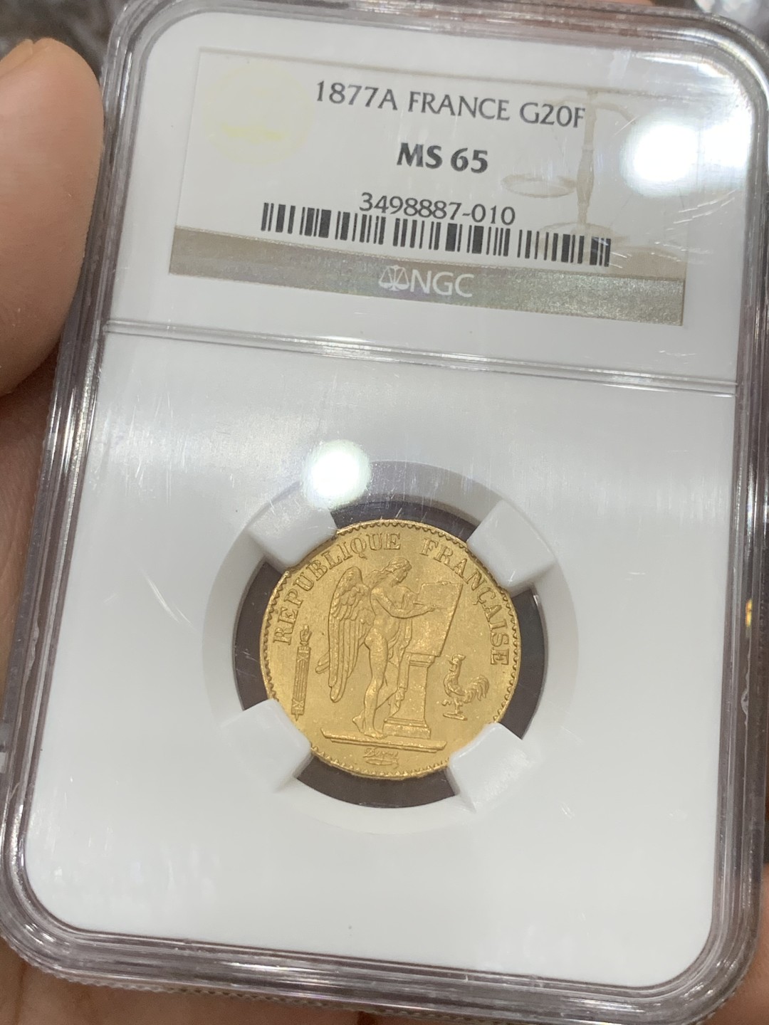 《竞宝斋》第91场-本周日，周一2场连拍（全场不限金额包邮） NGC MS65 法国1877年宪法天使20法郎幸运金币高分少见