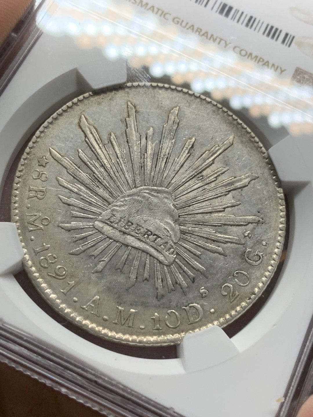 《竞宝斋》第91场-本周日，周一2场连拍（全场不限金额包邮）  NGC-UNC 墨西哥 1891年 MO AM版8R鹰洋银币 有污渍 洗洗可搏分