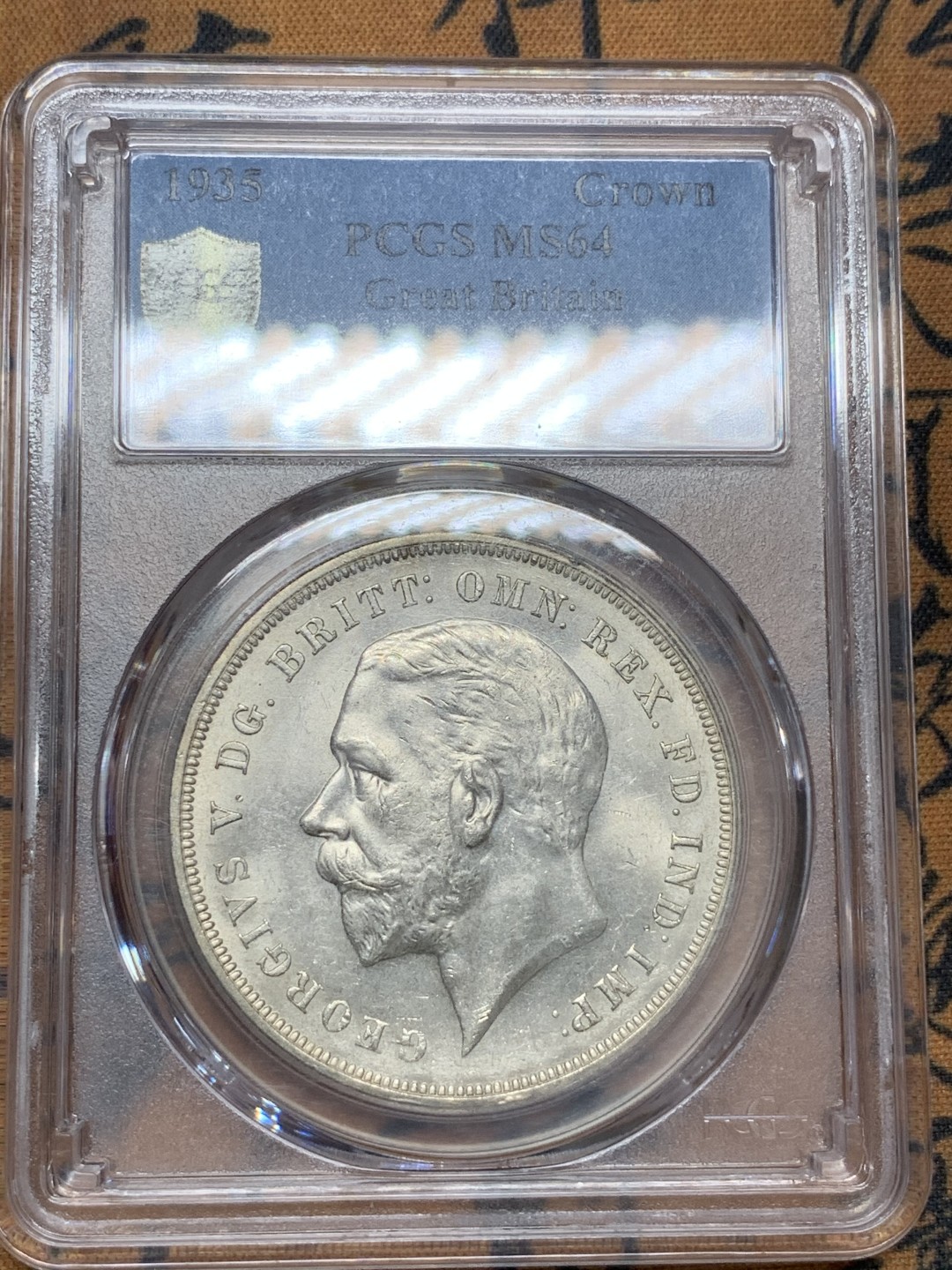 《竞宝斋》第91场-本周日，周一2场连拍（全场不限金额包邮） PCGS-MS64 英国 1935年乔治五世一克朗木马剑银币 转光好品