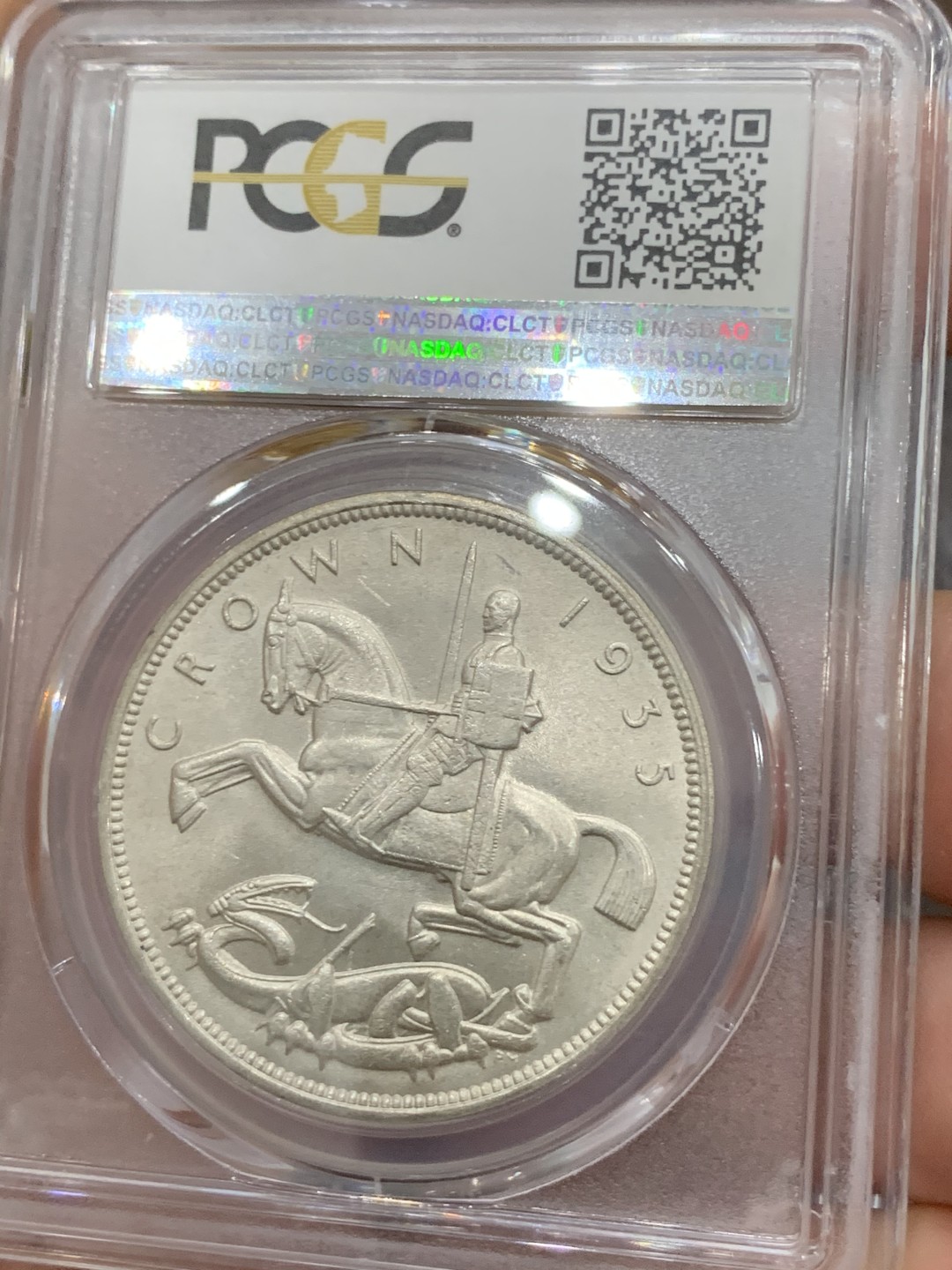 《竞宝斋》第91场-本周日，周一2场连拍（全场不限金额包邮） PCGS-MS64 英国 1935年乔治五世一克朗木马剑银币 转光好品