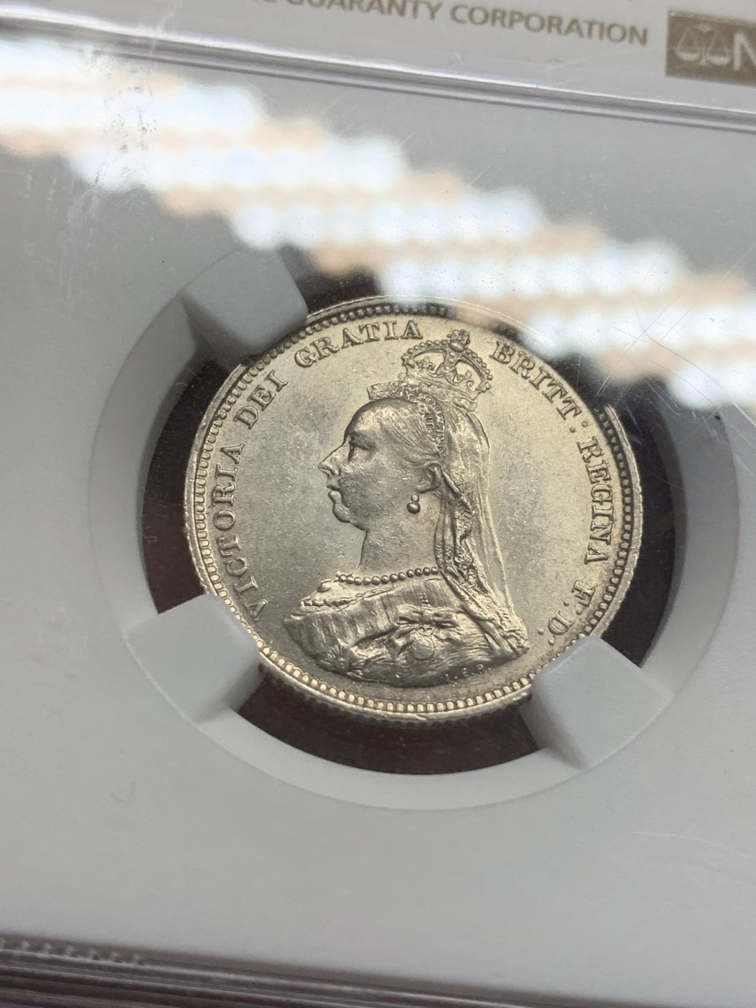 《竞宝斋》第91场-本周日，周一2场连拍（全场不限金额包邮） NGC MS63+ 英国 1887年维多利亚高冠1先令