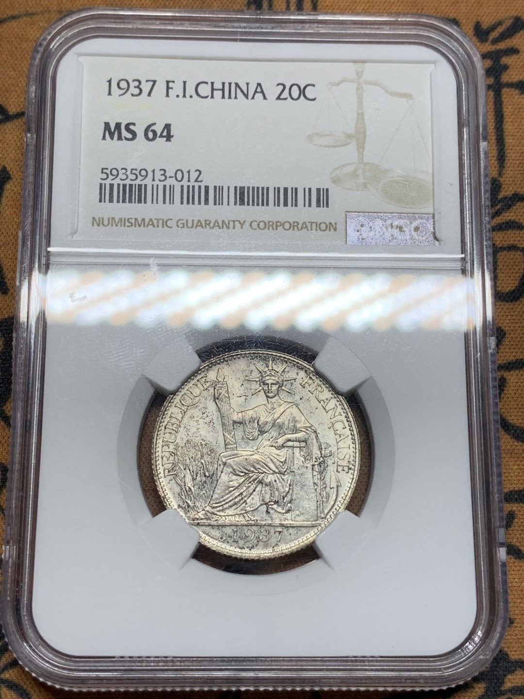 《竞宝斋》第91场-本周日，周一2场连拍（全场不限金额包邮） NGC-MS64 法属印支1937年 20C坐洋，全脸高鼻梁，64难得高分