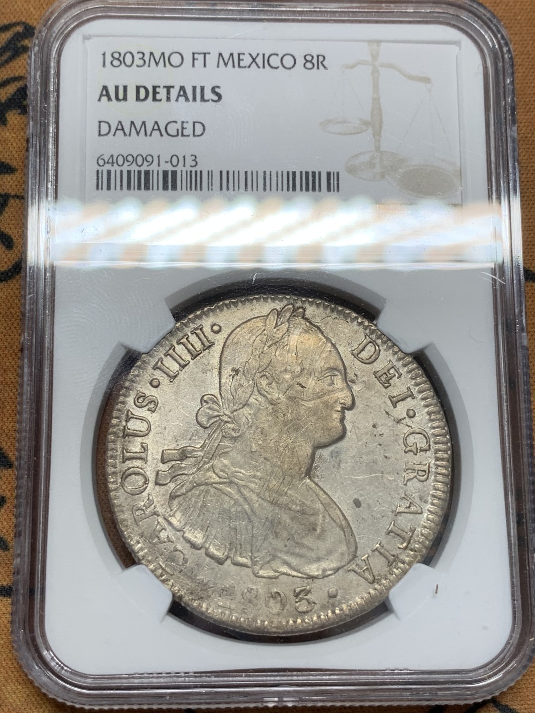 《竞宝斋》第91场-本周日，周一2场连拍（全场不限金额包邮） NGC AU 墨西哥 1803年 卡四 8R 双柱 大银币 打制的不错