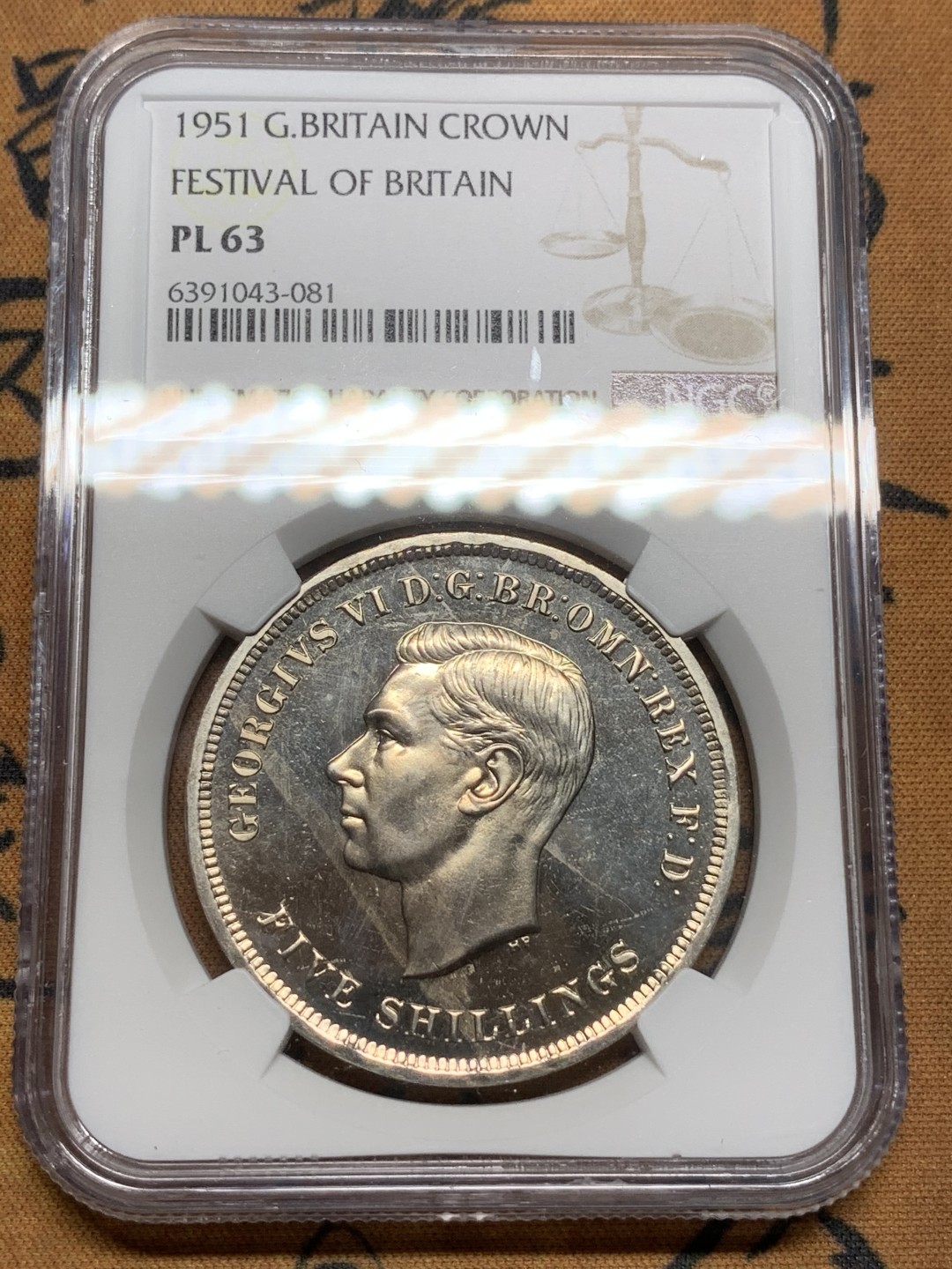 《竞宝斋》第91场-本周日，周一2场连拍（全场不限金额包邮） NGC PL63 英国 1951年乔治六世一克朗 全银光好品相