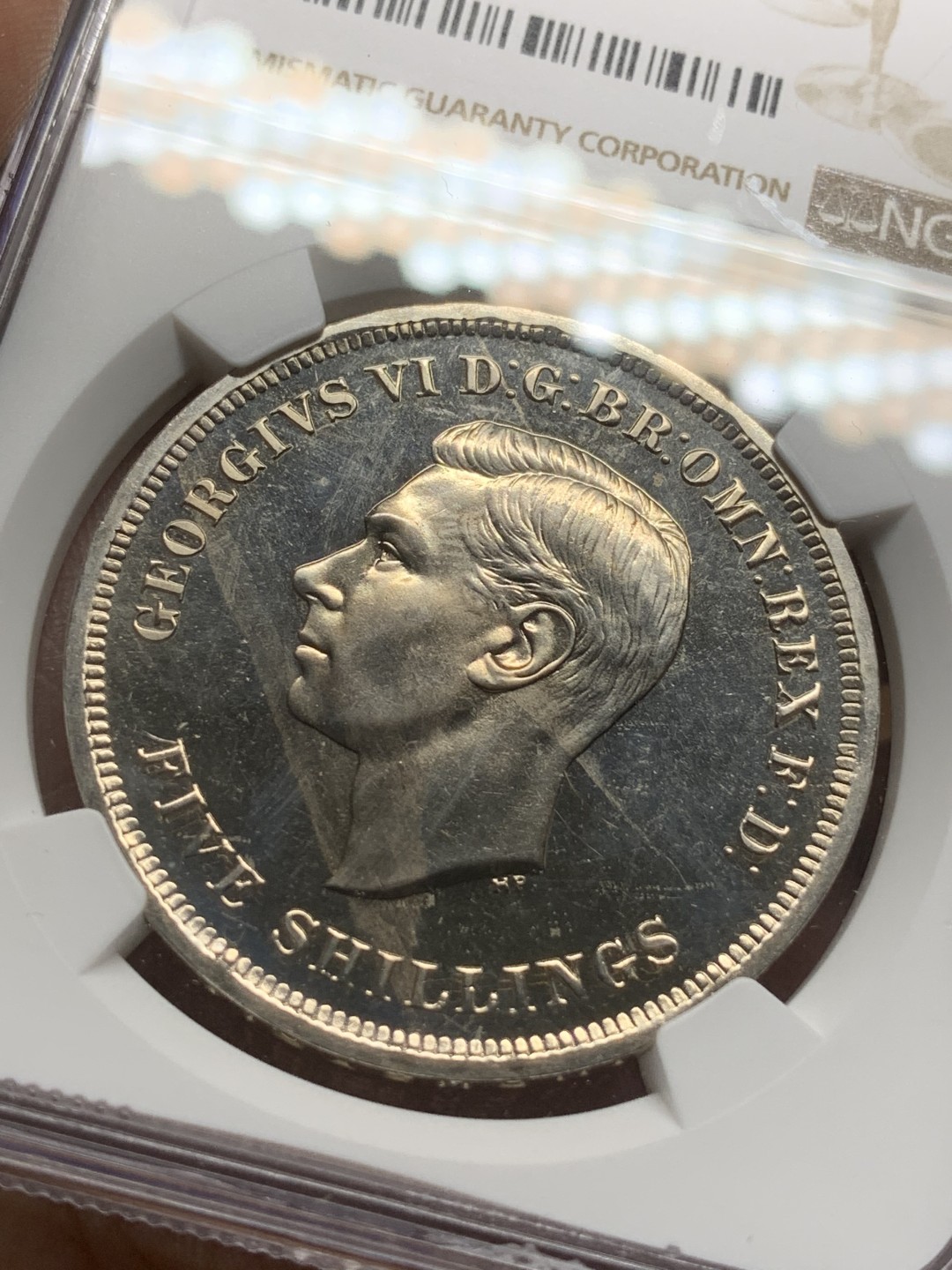 《竞宝斋》第91场-本周日，周一2场连拍（全场不限金额包邮） NGC PL63 英国 1951年乔治六世一克朗 全银光好品相