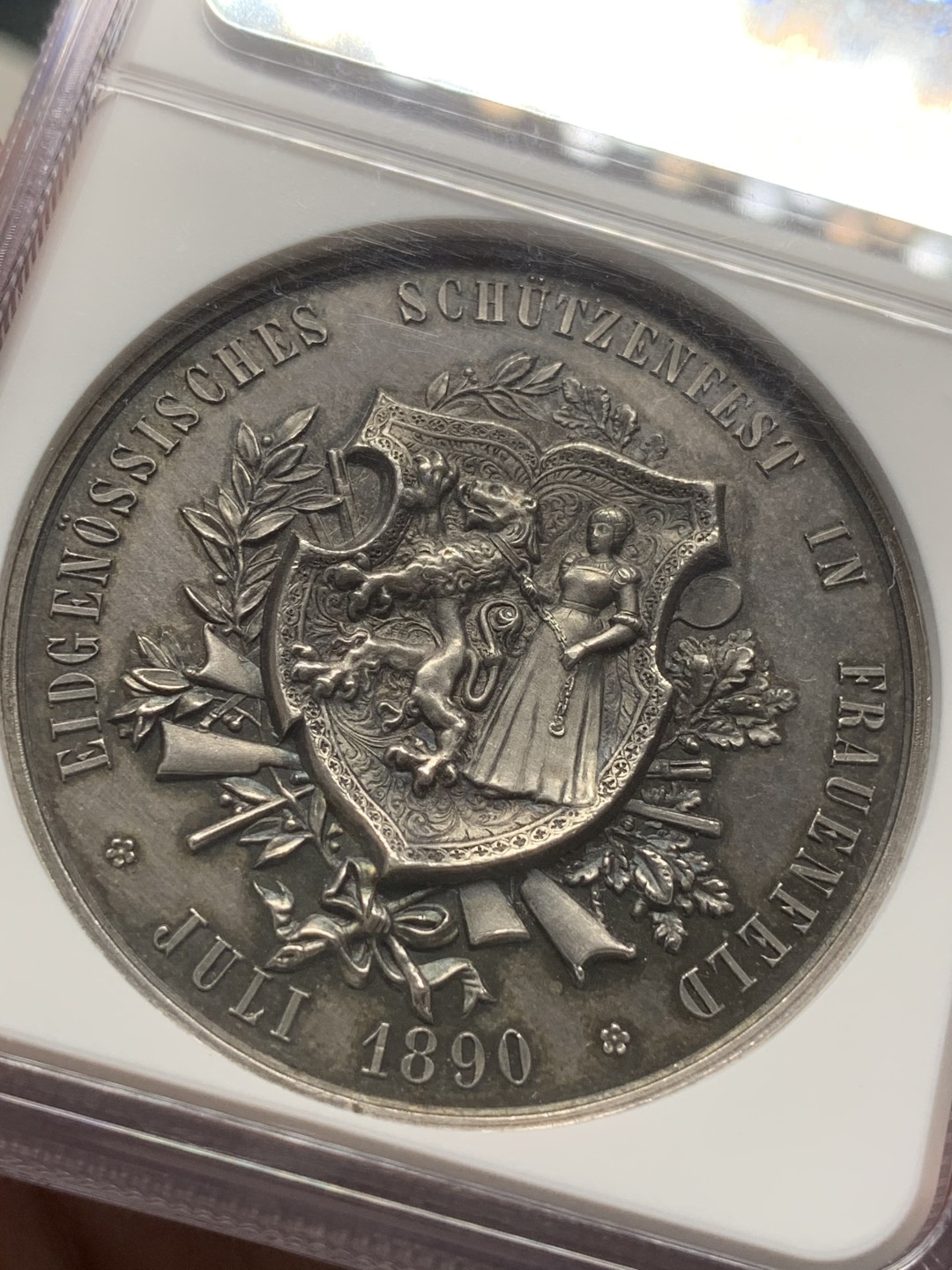 《竞宝斋》第91场-本周日，周一2场连拍（全场不限金额包邮） NGC-MS61 1890 瑞士图尔高射击节 银章 细节炸天 背面牵着狮子的链条清晰可见