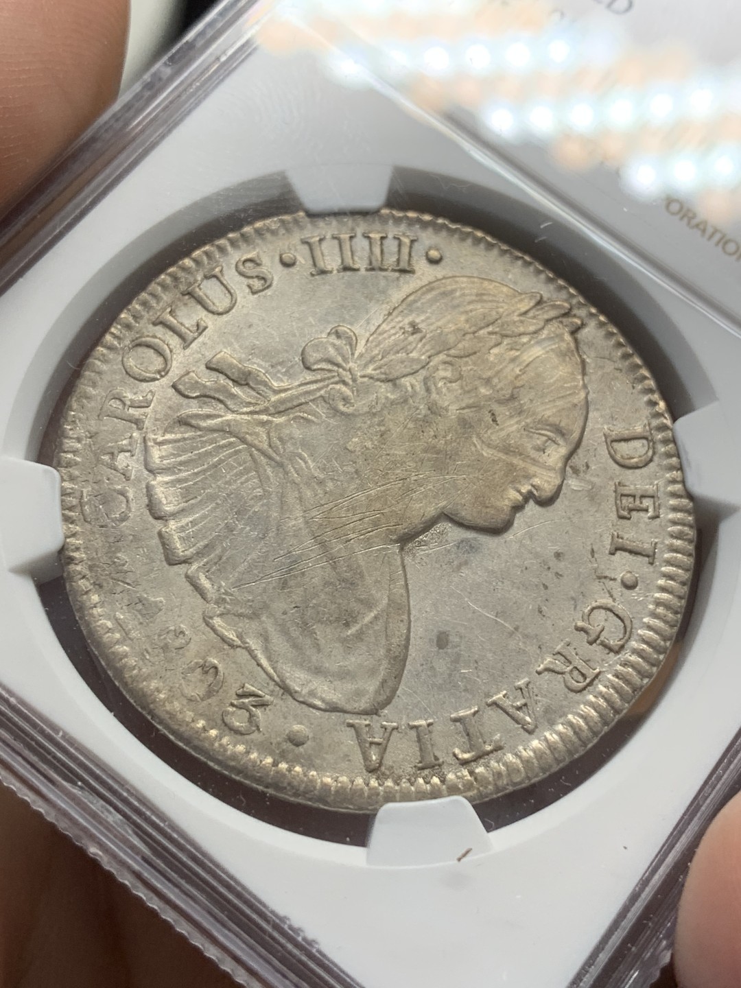 《竞宝斋》第91场-本周日，周一2场连拍（全场不限金额包邮） NGC AU 墨西哥 1803年 卡四 8R 双柱 大银币 打制的不错