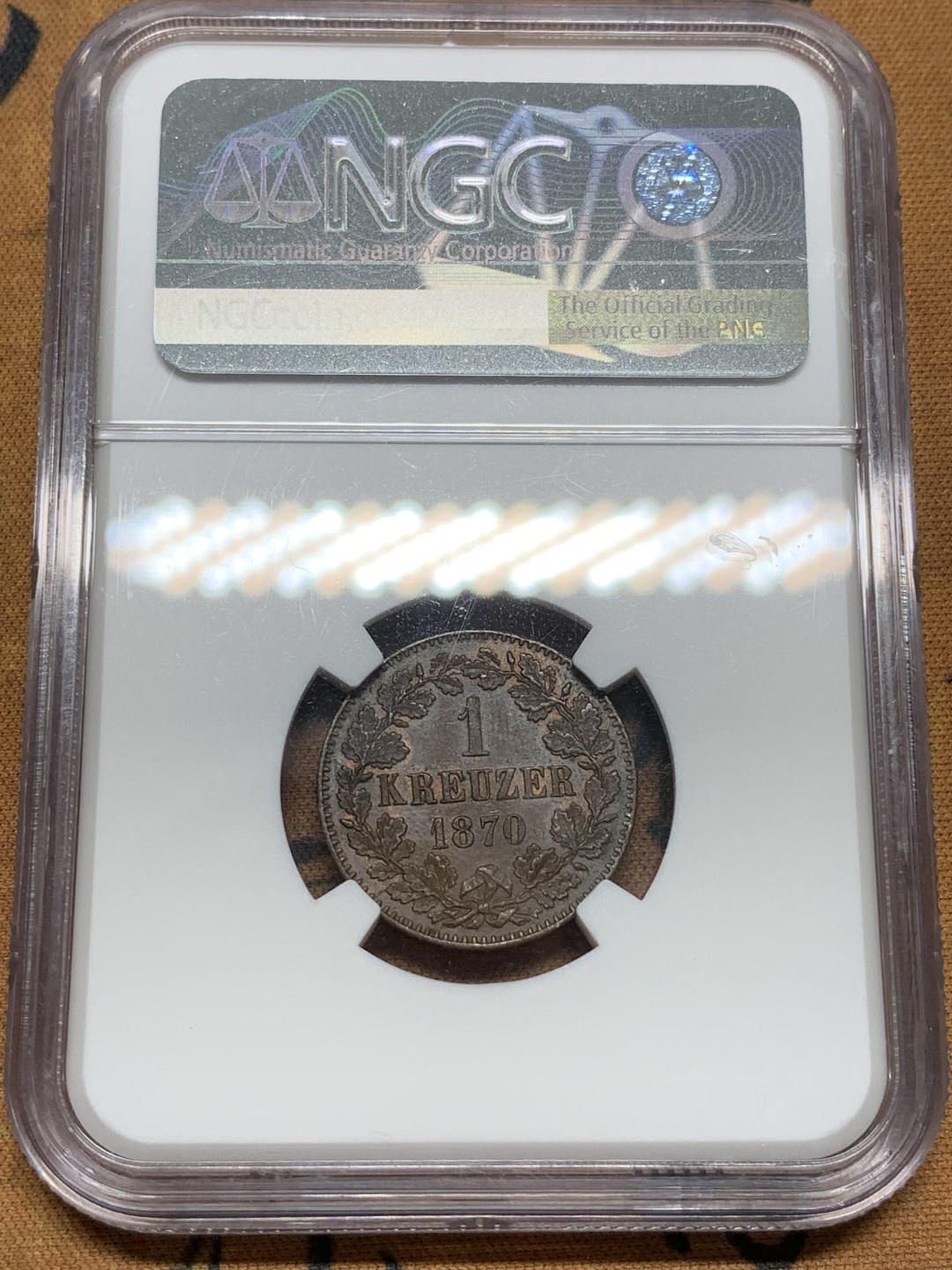 《竞宝斋》第91场-本周日，周一2场连拍（全场不限金额包邮） NGC-MS63BN 1870年 德国 巴登1克鲁泽铜币 亚军分数，经典双狮盾徽。