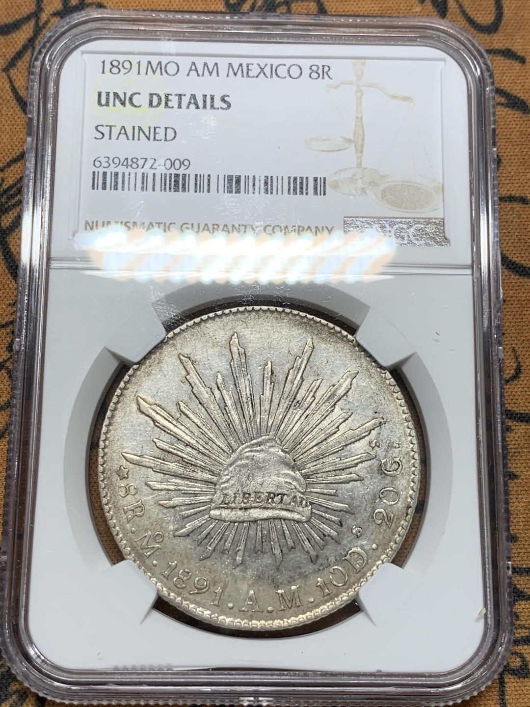 《竞宝斋》第91场-本周日，周一2场连拍（全场不限金额包邮）  NGC-UNC 墨西哥 1891年 MO AM版8R鹰洋银币 有污渍 洗洗可搏分