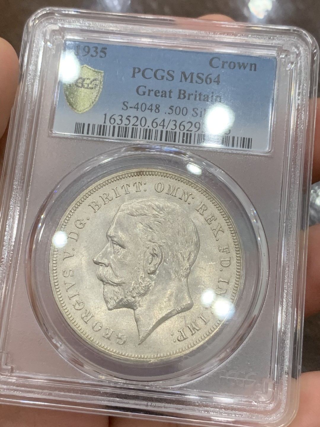 《竞宝斋》第91场-本周日，周一2场连拍（全场不限金额包邮） PCGS-MS64 英国 1935年乔治五世一克朗木马剑银币 转光好品