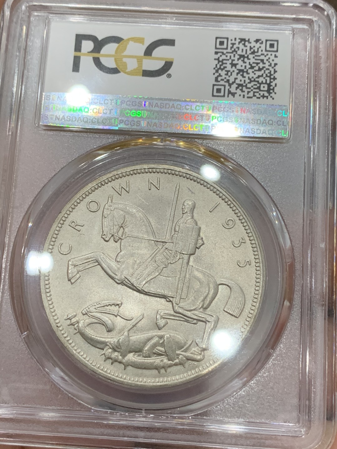 《竞宝斋》第91场-本周日，周一2场连拍（全场不限金额包邮） PCGS-MS64 英国 1935年乔治五世一克朗木马剑银币 转光好品