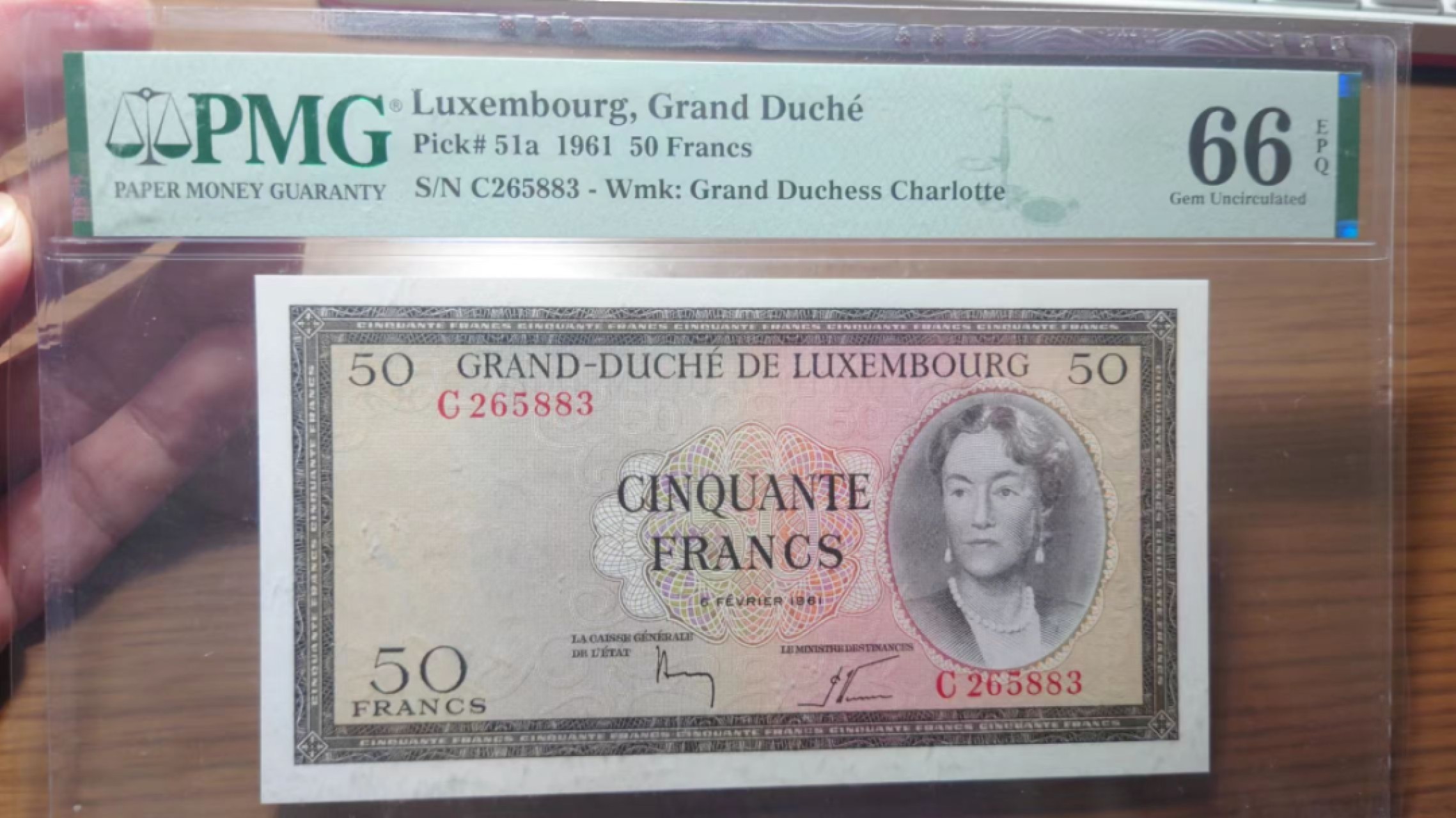 9.1-9.3限时团购 港澳台及外钞评级币专场  1961年卢森堡50法郎 PMG66E 无47号码