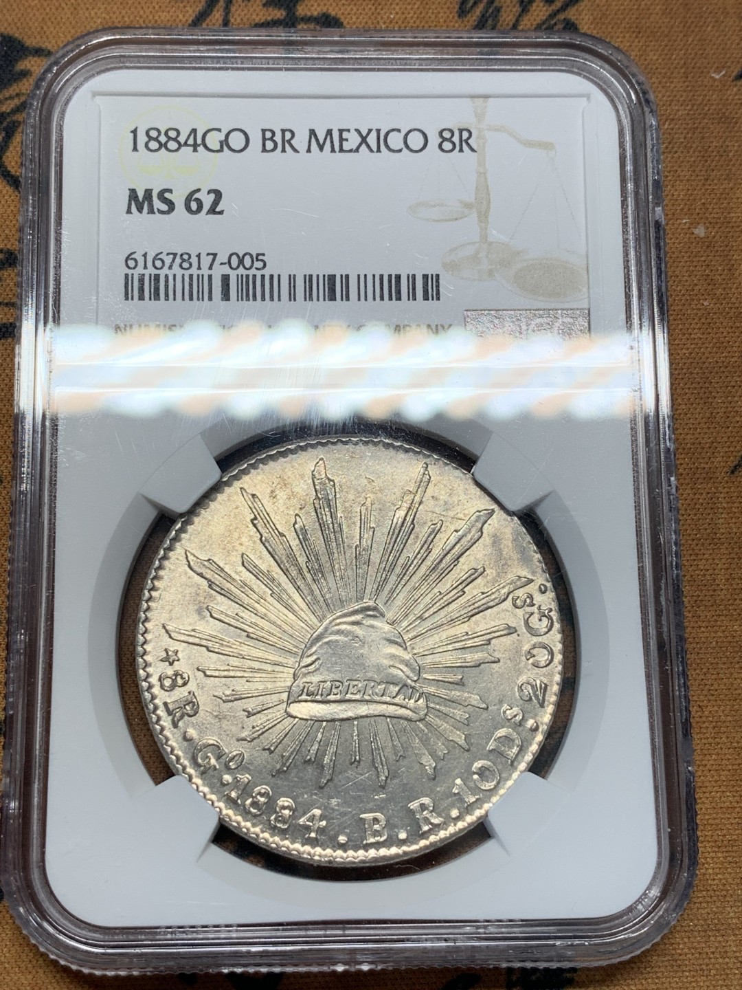 《竞宝斋》第93场-本周日，周一2场连拍（全场不限金额包邮） NGC MS62  墨西哥 1884年GO 版 8R 鹰洋 大银币 状态细节都很好 羽毛全