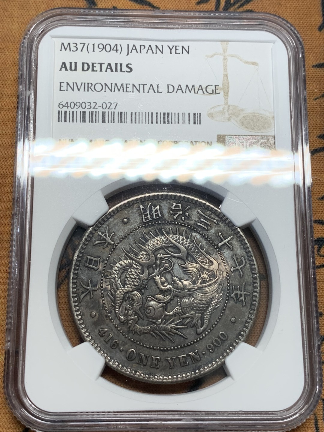 《竞宝斋》第93场-本周日，周一2场连拍（全场不限金额包邮） NGC AU 日本 1904年 明治三十七年 日龙 壹元 银币 深黑包浆 底板 细节俱佳