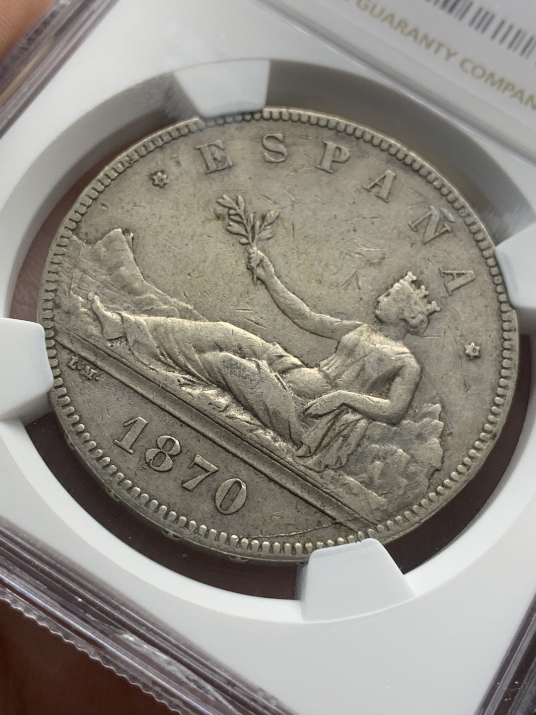 《竞宝斋》第93场-本周日，周一2场连拍（全场不限金额包邮） NGC XF40 西班牙 1870年 拿花女神5比塞塔双柱银币 老包浆原状态 