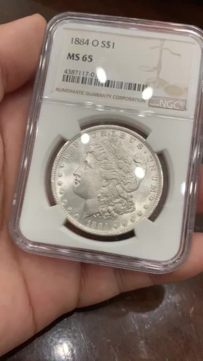 《竞宝斋》第93场-本周日，周一2场连拍（全场不限金额包邮） NGC-MS65 美国 1884年 1美元 O版摩根银币 新奥尔良造币厂 状态出色