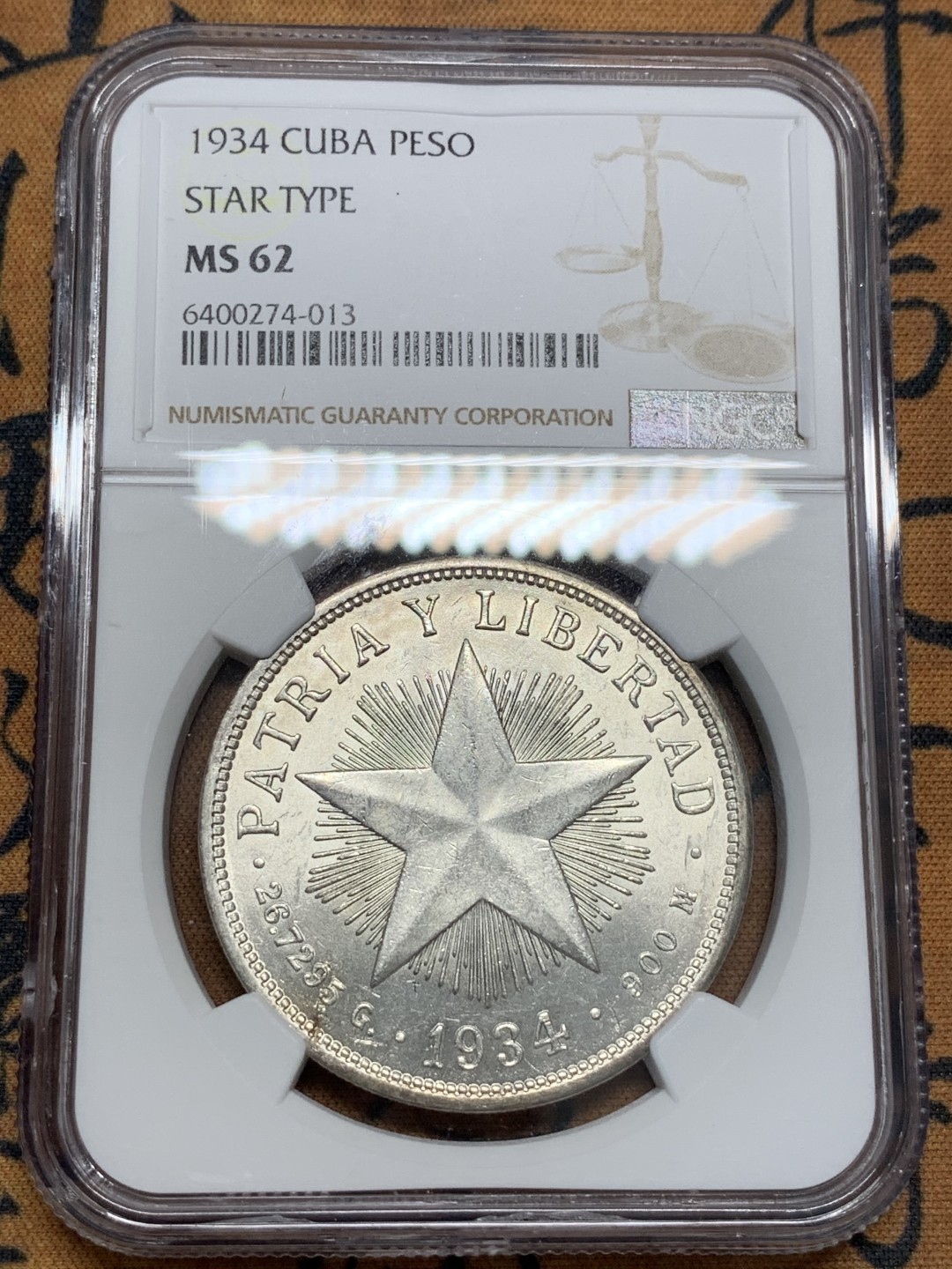 《竞宝斋》第93场-本周日，周一2场连拍（全场不限金额包邮） NGC MS62 古巴1934年 五星比索 知名品种 最近也少见了 原光 银币