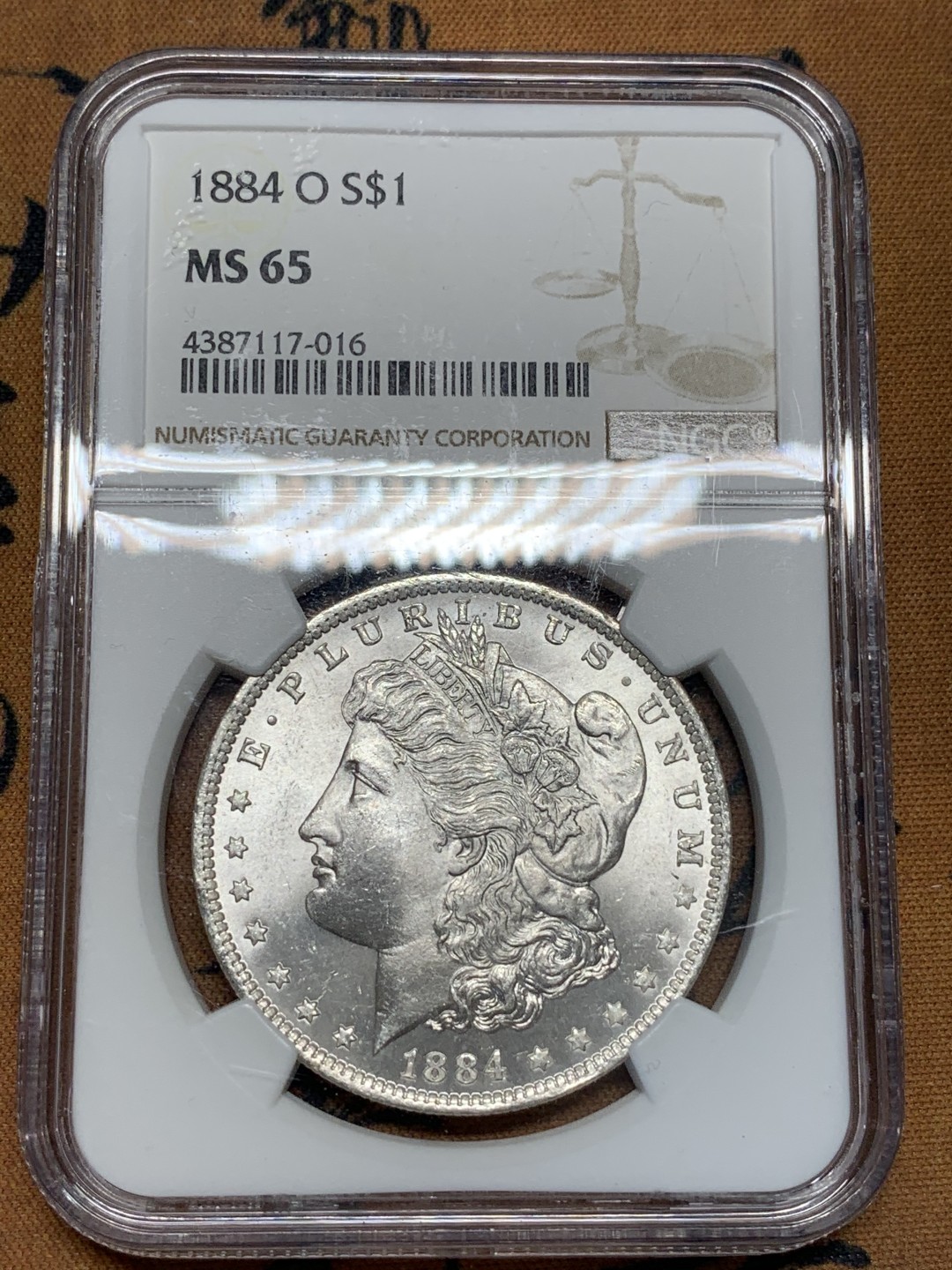 《竞宝斋》第93场-本周日，周一2场连拍（全场不限金额包邮） NGC-MS65 美国 1884年 1美元 O版摩根银币 新奥尔良造币厂 状态出色